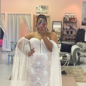 All over lace fit and flare wedding dress with plunging neckline